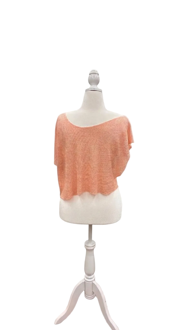 Blush -colored knitted top on a mannequin against a white background