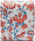 Floral patterned fabric with red and blue flowers on a white background