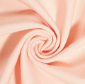 Close-up of pink fabric with a swirl pattern