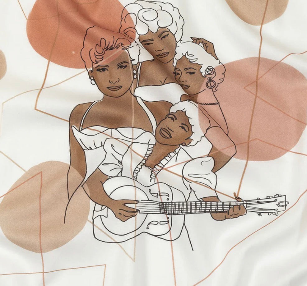 fabric with Illustration of a woman holding a baby with a guitar, surrounded by abstract shapes.